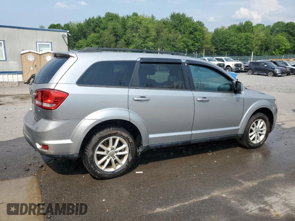 2017 Dodge Journey SXT with VIN 3C4PDDBG5HT575049, listed as a Copart auction lot 59027625 with 71,603 mi miles and Salvage title. Bid and sale history available at DreamBid. Image 3.
