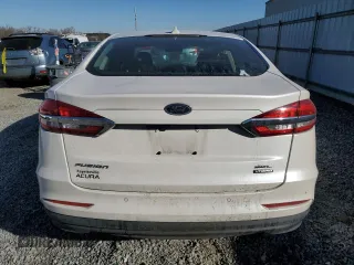 2020 Ford Fusion Hybrid SEL with VIN 3FA6P0MU0LR129742, listed as a Copart auction lot 88924535 with 79,949 mi miles and Salvage Title. Bid and sale history available at carsss.com. Image 6.