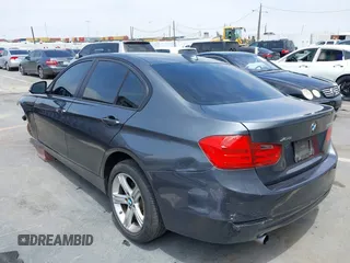 2014 BMW 3 Series 320i xDrive with VIN WBA3C3C58EP661414, listed as a IAAI auction lot 42489010 with 93,488 mi miles and . Bid and sale history available at DreamBid. Image 3.