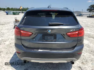 2017 BMW X1 sDrive28i with VIN WBXHU7C32HP925374, listed as a Copart auction lot 54820225 with 136,708 mi miles and Clean Title. Bid and sale history available at carsss.com. Image 6.