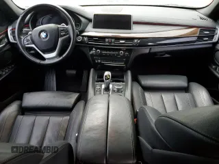 2017 BMW X6 sDrive35i with VIN 5UXKU0C33H0G69427, listed as a Copart auction lot 74011314 with 0 mi miles and Salvage Title. Bid and sale history available at carsss.com. Image 8.