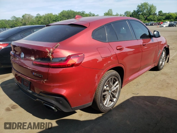 2021 BMW X4 M40i with VIN 5UX2V5C0XM9E78318, listed as a Copart auction lot 57834645 with 67,277 mi miles and Salvage title. Bid and sale history available at DreamBid. Image 3.