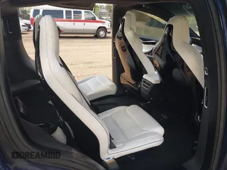 2016 Tesla Model X 70D z VIN 5YJXCBE20GF006744, wystawiony jako IAAI lot #42045005 z przebiegiem 169 619 mil mil oraz . Historia ofert i sprzedaży dostępna na DreamBid. Obrazek 8.