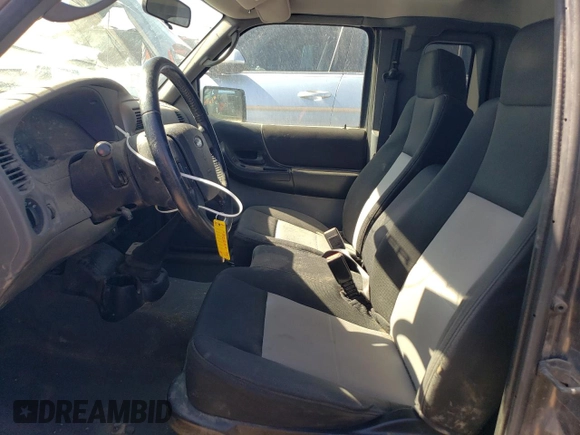 2009 Ford Ranger XLT with VIN 1FTZR45E69PA06141, listed as a Copart auction lot 43617815 with 102,986 mi miles and Salvage title. Bid and sale history available at DreamBid. Image 7.