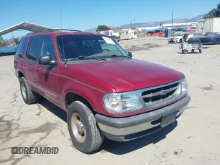 1998 Ford Explorer XL z VIN 1FMZU34E5WZA93875, wystawiony jako IAAI lot #41860604 z przebiegiem 175 993 mil mil oraz . Historia ofert i sprzedaży dostępna na DreamBid. Obrazek 1.