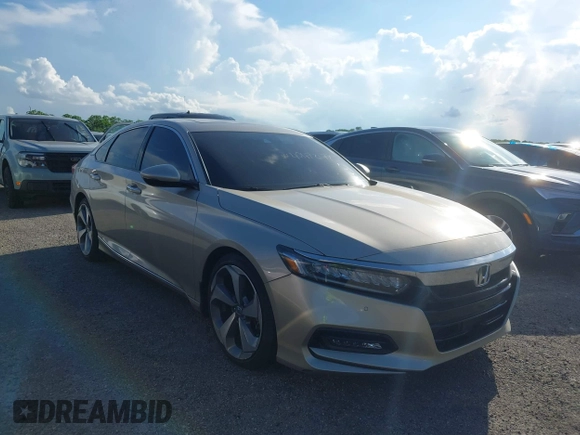 2020 Honda Accord Touring with VIN 1HGCV2F99LA029545, listed as a IAAI auction lot 40472177 with 44,960 mi miles and . Bid and sale history available at DreamBid. Image 1.