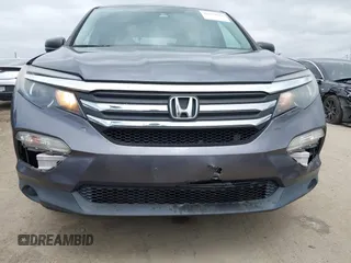 2016 Honda Pilot LX with VIN 5FNYF5H14GB037205, listed as a IAAI auction lot 42034018 with 101,943 mi miles and . Bid and sale history available at DreamBid. Image 6.