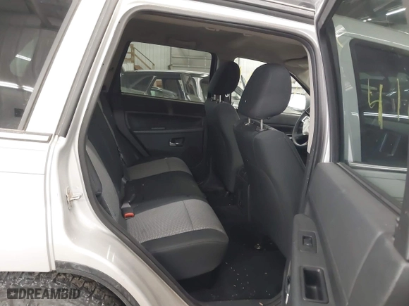 2009 Jeep Grand Cherokee Laredo with VIN 1J8GR48KX9C516873, listed as a IAAI auction lot 41610781 with 199,246 mi miles. Bid and sale history available at carsss.com. Image 8.