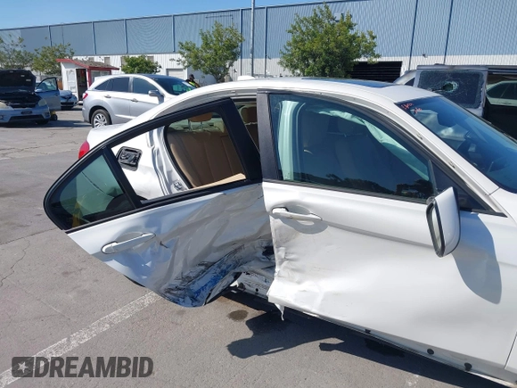 2014 BMW 3 Series 320i with VIN WBA3B1G50ENN90657, listed as a IAAI auction lot 42304612 with 129,377 mi miles and . Bid and sale history available at DreamBid. Image 6.