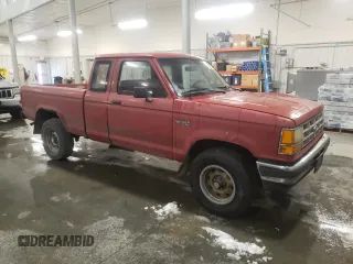 1990 Ford Ranger with VIN 1FTCR15T6LPB12535, listed as a Copart auction lot 80228504 with 58,980 mi miles and Salvage Title. Bid and sale history available at carsss.com. Image 4.