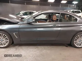 2014 BMW 4 Series 428i xDrive with VIN WBA3T1C59EPS98299, listed as a IAAI auction lot 41741235 with 93,000 mi miles and . Bid and sale history available at carsss.com. Image 14.