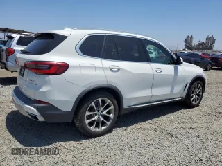 2019 BMW X5 xDrive40i with VIN 5UXCR6C54KLK88490, listed as a Copart auction lot 57917005 with 50,948 mi miles and Salvage title. Bid and sale history available at DreamBid. Image 3.