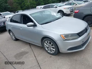 2014 Volkswagen Jetta SE with VIN 3VWD07AJ0EM239714, listed as a IAAI auction lot 42428082 with 124,221 mi miles and . Bid and sale history available at DreamBid. Image 1.