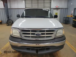 2001 Ford F-150 XL with VIN 1FTRX17L51NB25752, listed as a Copart auction lot 48721235 with 179,941 mi miles and Salvage title. Bid and sale history available at DreamBid. Image 5.