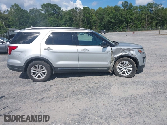 2018 Ford Explorer XLT z VIN 1FM5K8D81JGA36587, wystawiony jako IAAI lot #42534483 z przebiegiem 132 667 mil mil oraz . Historia ofert i sprzedaży dostępna na DreamBid. Obrazek 13.