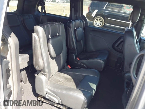 2014 Dodge Grand Caravan SXT with VIN 2C4RDGCGXER261467, listed as a IAAI auction lot 41801810 with 97,322 mi miles and . Bid and sale history available at DreamBid. Image 8.