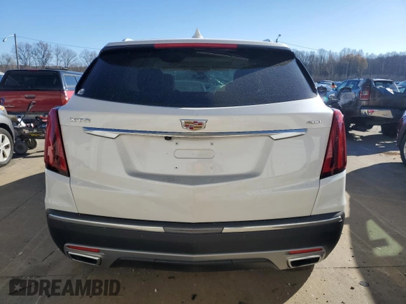 2021 Cadillac XT5 FWD Premium Luxury with VIN 1GYKNCRS0MZ198199, listed as a Copart auction lot 83595494 with 27,923 mi miles and Salvage Title. Bid and sale history available at carsss.com. Image 6.