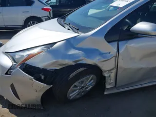2018 Toyota Prius Two with VIN JTDKBRFU6J3068322, listed as a IAAI auction lot 42001483 with 57,597 mi miles. Bid and sale history available at carsss.com. Image 6.