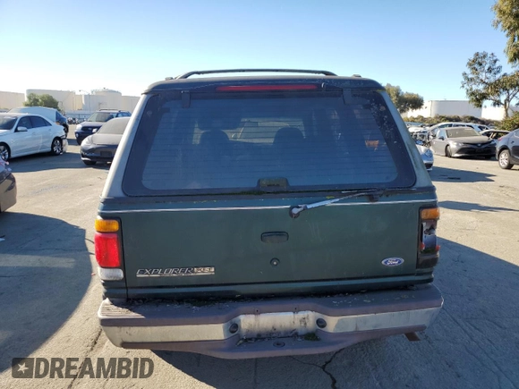 1996 Ford Explorer XL z VIN 1FMDU34X0TUC31973, wystawiony jako Copart lot #87892655 z przebiegiem 142 774 mil mil oraz Tytuł czysty. Historia ofert i sprzedaży dostępna na DreamBid. Obrazek 6.