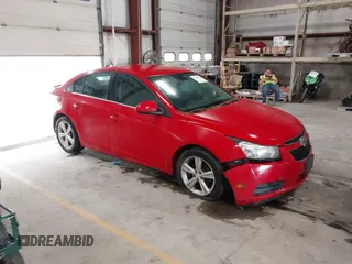 2014 Chevrolet Cruze 2LT z VIN 1G1PE5SB0E7309535, wystawiony jako IAAI lot #42416683 z przebiegiem 143 071 mil mil oraz . Historia ofert i sprzedaży dostępna na DreamBid. Obrazek 1.