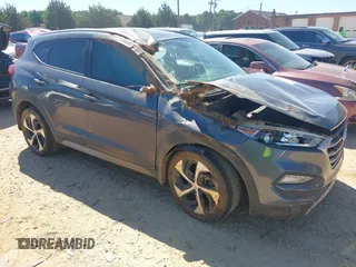 2018 Hyundai Tucson Sport z VIN KM8J33ALXJU734205, wystawiony jako IAAI lot #42342574 z przebiegiem 92 389 mil mil oraz . Historia ofert i sprzedaży dostępna na DreamBid. Obrazek 1.