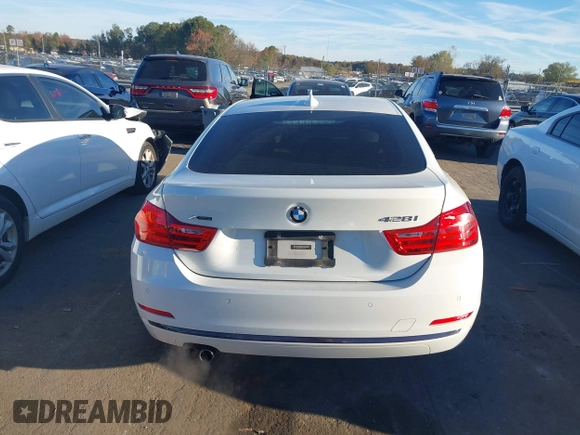 2016 BMW 4 Series 428i xDrive with VIN WBA4C9C54GG139275, listed as a IAAI auction lot 40828786 with 128,124 mi miles and . Bid and sale history available at carsss.com. Image 16.