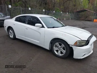 2012 Dodge Charger SE with VIN 2C3CDXBG0CH190147, listed as a IAAI auction lot 41975277 with 239,977 mi miles. Bid and sale history available at carsss.com. Image 1.