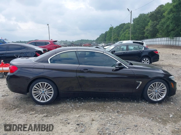 2014 BMW 4 Series 435i with VIN WBA3T3C50EJ876997, listed as a IAAI auction lot 42406299 with 115,048 mi miles and . Bid and sale history available at DreamBid. Image 13.
