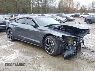 2023 Audi RS e-tron GT z VIN WAUBHBFWXP7903392, wystawiony jako IAAI lot #41020487 z przebiegiem 9046 mil mil oraz . Historia ofert i sprzedaży dostępna na DreamBid. Obrazek 1.