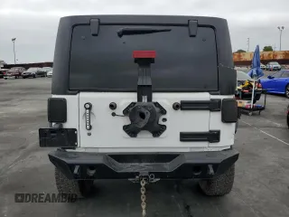 2018 Jeep Wrangler Unlimited Sport S with VIN 1C4BJWDG9JL887033, listed as a Copart auction lot 61785565 with 66,725 mi miles and Salvage title. Bid and sale history available at DreamBid. Image 6.