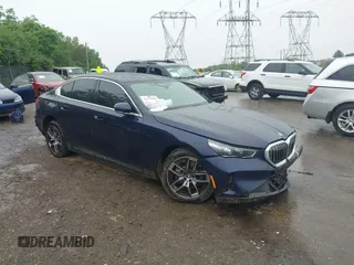 2024 BMW i5 eDrive40 with VIN WBY33FK00RCP59374, listed as a IAAI auction lot 42351800 with Not provided miles and . Bid and sale history available at DreamBid. Image 1.