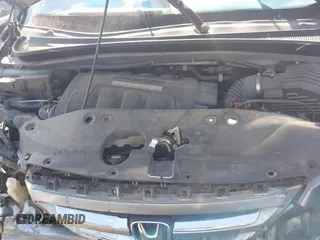 2007 Honda Odyssey EX-L with VIN 5FNRL38677B054173, listed as a IAAI auction lot 41888792 with 142,438 mi miles and . Bid and sale history available at DreamBid. Image 10.