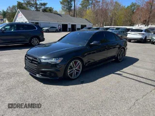 2018 Audi S6 Premium Plus z VIN WAUFFAFC6JN000859, wystawiony jako Copart lot #58193725 z przebiegiem 120 327 mil mil oraz Tytuł czysty. Historia ofert i sprzedaży dostępna na DreamBid. Obrazek 1.