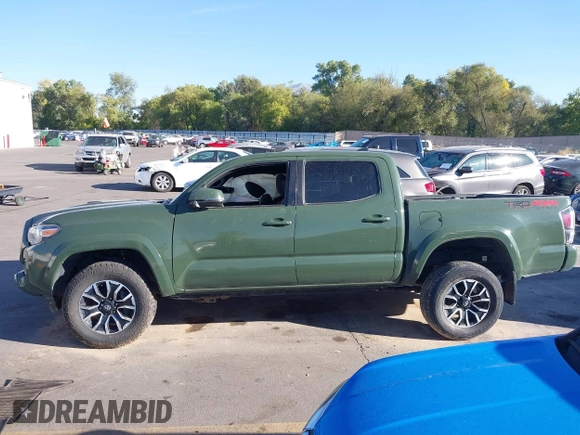 2021 Toyota Tacoma SR with VIN 3TYCZ5AN2MT039450, listed as a IAAI auction lot 40457613 with 54,176 mi miles and . Bid and sale history available at DreamBid. Image 14.
