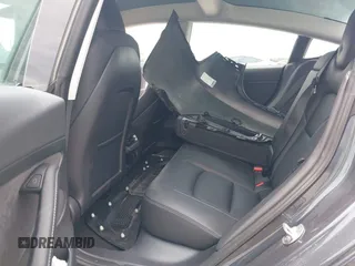 2023 Tesla Model 3 with VIN 5YJ3E1EA7PF417293, listed as a IAAI auction lot 42407659 with 22,578 mi miles and . Bid and sale history available at DreamBid. Image 8.