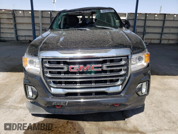 2021 GMC Canyon 4WD AT4 w/Cloth with VIN 1GTG6FEN0M1273816, listed as a Copart auction lot 65976804 with 28,082 mi miles and Salvage Title. Bid and sale history available at carsss.com. Image 5.