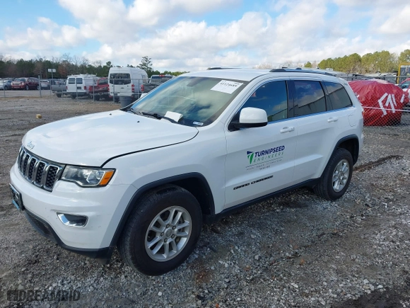 2018 Jeep Grand Cherokee Laredo E with VIN 1C4RJFAG8JC424609, listed as a IAAI auction lot 41124689 with 101,643 mi miles. Bid and sale history available at carsss.com. Image 2.