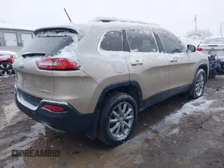 2015 Jeep Cherokee Limited z VIN 1C4PJMDS5FW623361, wystawiony jako IAAI lot #40920356 z przebiegiem 110 989 mil mil oraz . Historia ofert i sprzedaży dostępna na DreamBid. Obrazek 4.