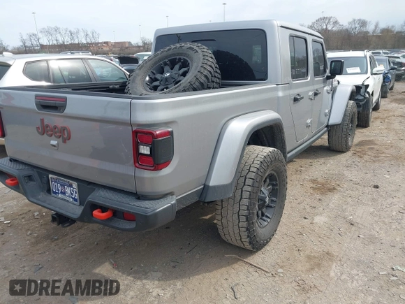 2021 Jeep Gladiator Mojave with VIN 1C6JJTEG9ML519309, listed as a IAAI auction lot 41701544 with 64,461 mi miles and . Bid and sale history available at DreamBid. Image 4.