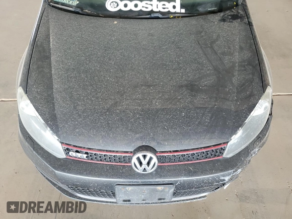 2012 Volkswagen GTI w/Sunroof & Navi PZEV z VIN WVWGD7AJ0CW244915, wystawiony jako Copart lot #56742855 z przebiegiem 177 026 mil mil oraz Szkoda całkowita • Salvage title. Historia ofert i sprzedaży dostępna na DreamBid. Obrazek 11.