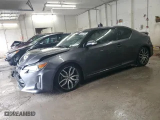 2015 Scion tC with VIN JTKJF5C70FJ002254, listed as a Copart auction lot 53077385 with 117,221 mi miles and Salvage Title. Bid and sale history available at carsss.com. Image 1.