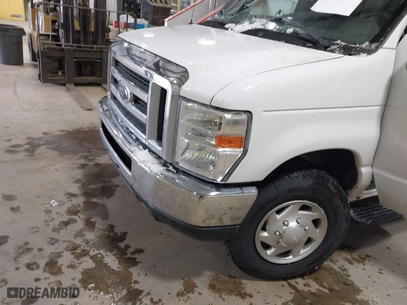 2012 Ford Econoline Wagon XL with VIN 1FBNE3BLXCDB00141, listed as a IAAI auction lot 41623087 with 173,289 mi miles. Bid and sale history available at carsss.com. Image 6.