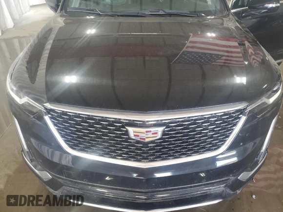 2023 Cadillac XT6 AWD Premium Luxury z VIN 1GYKPDRS6PZ129957, wystawiony jako Copart lot #58808245 z przebiegiem Nie podano mil oraz Czysty tytuł • Clean title. Historia ofert i sprzedaży dostępna na DreamBid. Obrazek 12.