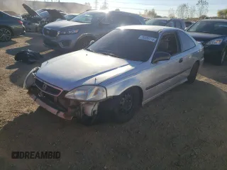 1999 Honda Civic DX with VIN 1HGEJ612XXL034351, listed as a Copart auction lot 76589714 with 192,975 mi miles and Salvage Title. Bid and sale history available at carsss.com. Image 1.