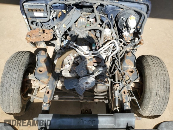 2005 Jeep Wrangler Unlimited с VIN 1J4FA44S65P376026, выставлен на аукционе Copart как лот 57692645 с пробегом Не указан миль и Чистый • Clean title. История ставок и продаж доступна на DreamBid. Изображение 11.