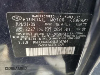 2009 Hyundai Elantra GLS z VIN KMHDU46D09U816764, wystawiony jako Copart lot #57595325 z przebiegiem 144 291 mil mil oraz Szkoda całkowita • Salvage title. Historia ofert i sprzedaży dostępna na DreamBid. Obrazek 13.