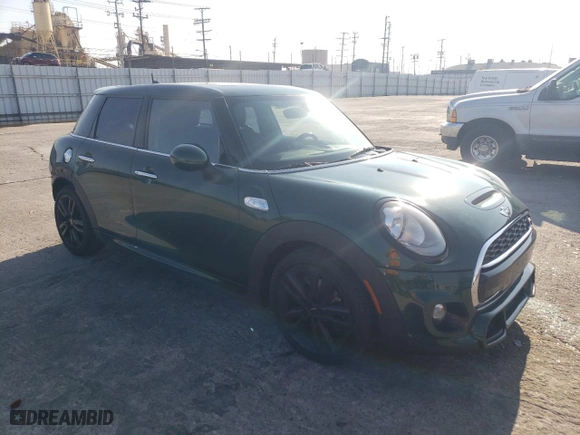 2016 MINI Cooper Hardtop 4 Door S with VIN WMWXU3C51G2D31535, listed as a Copart auction lot 42832355 with 95,458 mi miles and Salvage Title. Bid and sale history available at carsss.com. Image 4.