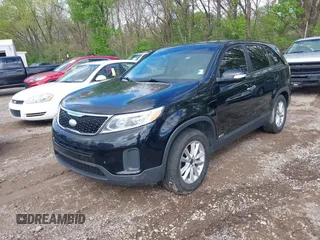 2014 Kia Sorento LX with VIN 5XYKTCA6XEG466573, listed as a IAAI auction lot 42092207 with 157,925 mi miles and . Bid and sale history available at carsss.com. Image 2.