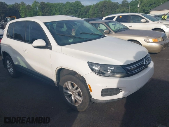 2013 Volkswagen Tiguan SE z VIN WVGAV7AX4DW555154, wystawiony jako IAAI lot #42200452 z przebiegiem 190 745 mil mil oraz . Historia ofert i sprzedaży dostępna na DreamBid. Obrazek 1.