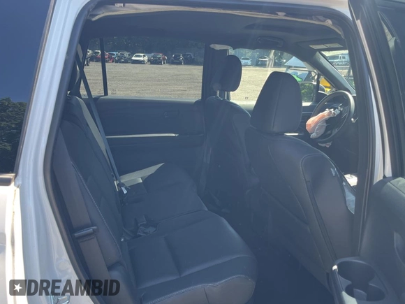 2023 Honda Passport EX-L with VIN 5FNYF8H55PB011474, listed as a Copart auction lot 62492595 with 18,327 mi miles and Salvage title. Bid and sale history available at DreamBid. Image 6.